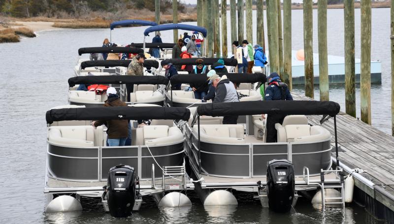 Local Freedom Boat Club members prepare to launch from the Riverside docks on the Broadkill River, not far from the entrance to Lewes-Rehoboth Canal.