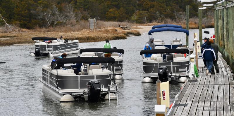 They’re off. Boat club members pull away from the Riverside dock located at the end of Pilottown Road in Lewes.