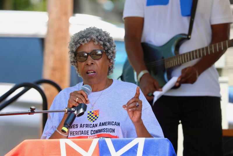 The Rev. Deborah McCaffity, pastor of St. George African Methodist Episcopal Church in Lewes, welcomes visitors and talks about the history of Juneteenth.