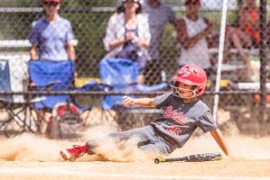 little-league-baseball-player-slides-into-home