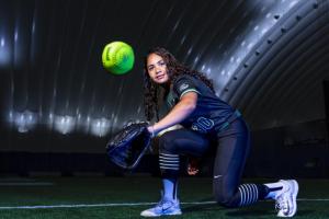 Softball-Player-Catches-Softball-for-Media-Day-Photo-Shoot