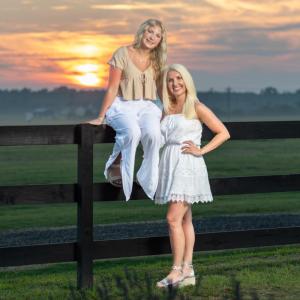 Mom-and-Daughter-Pose-on-Fence-at-Brittingham-Farms-Lavender-Field