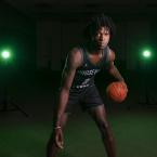 Male-Basketball-Player-Posing-for-Media-Day-Photos