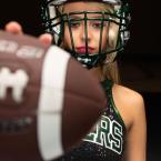 Cheerleader-Poses-with-Football-for-Media-Day-Photos