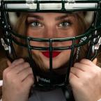 Cheerleader-Poses-with-Football-for-Media-Day-Photos