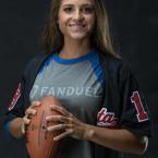 Female-Football-Player-Holds-Football-for-Media-Day-Photos