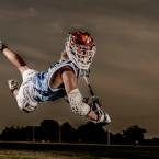 Male-LaCrosse-Player-Jumps-for-Media-Day-Photos